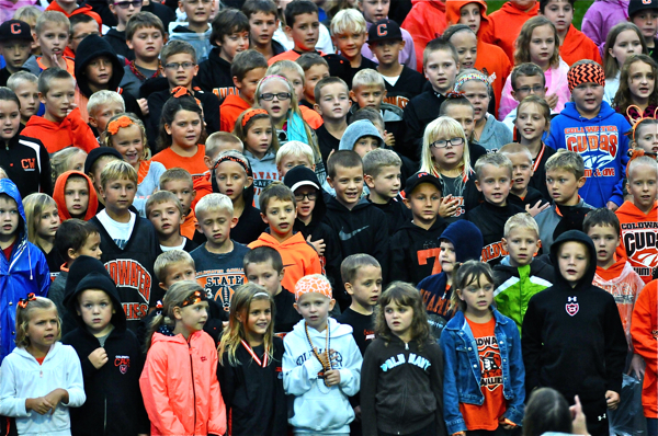 Elementary school children from Coldwater sang the National Anthem prior to Friday's game in remembrance of the anniversary of the 911 attack and its victims.