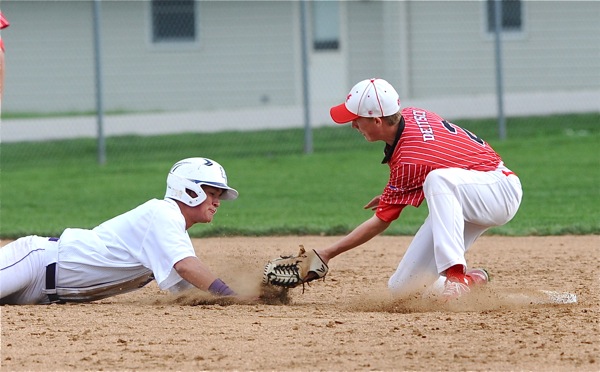 Fort Recovery's Ben Homan gets caught off second in the sixth inning of Thursday's win.