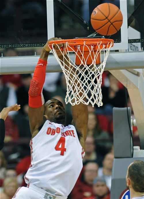 Hangin' Around...Freshman center Daniel Giddens eyes a potential rebound in the Bucks' win Wednesday over Michigan.