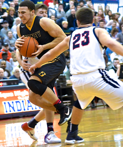 Isaiah Bowser works his way thru the Indians defense.