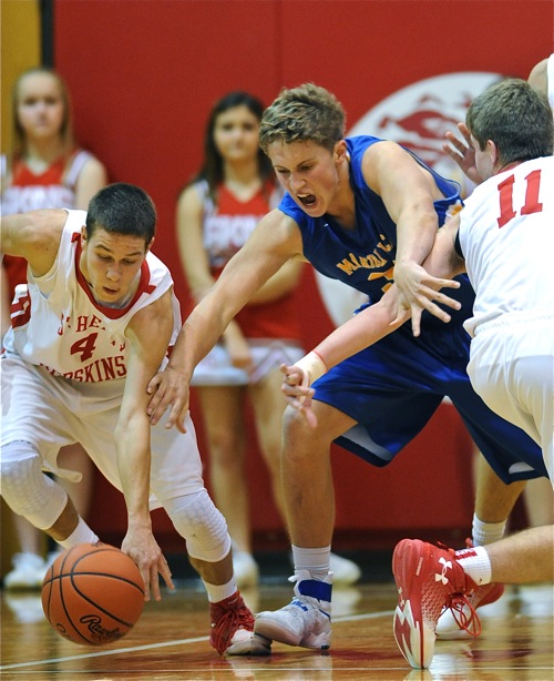 St. Henry's Ryan Bruening picks Marion's Justin Albers clean.