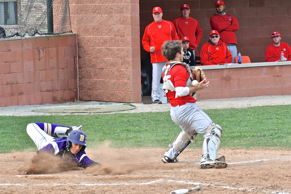 Cole Barhorst fumbles with the ball as one of the Butler Aviators scores.