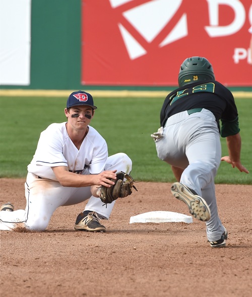 Flyer shortstop Brantley Johnson waits with the ball for Mason's Alejandro Aponte, trying to advance on a passed ball.