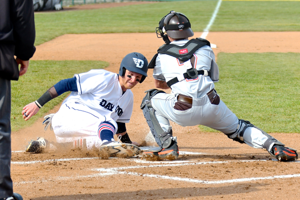 UD's Robbie Doring (safe at the plate)