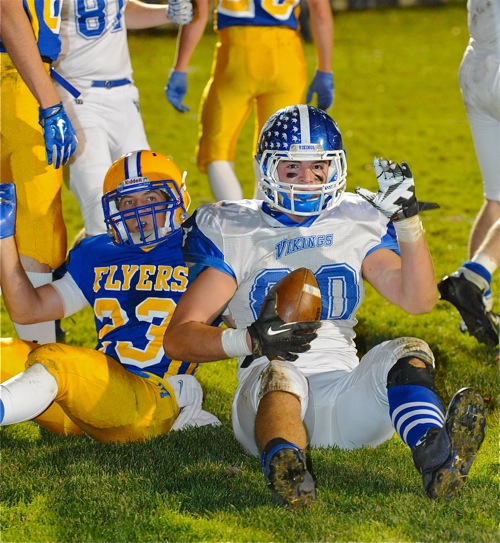 Classic look...Marion's gold pants with simple stripe on the helmets; and Miami East's white pants, complete with the classic look of the stirrup socks!