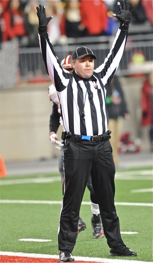 The only person that should be wearing black pants on a football is the referee.