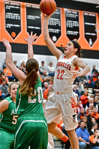Clair Schmitmeyer drives it in for a lay-up.