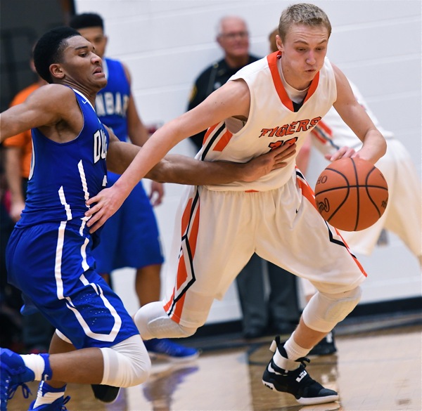 Alex Wendel strips Dunbar's Devon Baker of the ball and scored during the Tigers' fourth quarter comeback attempt.