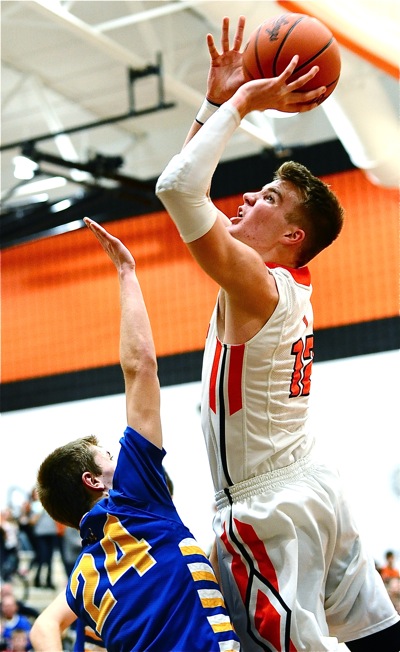 Justin Ahrens slashes to the rim for two of his team-high 20 points.
