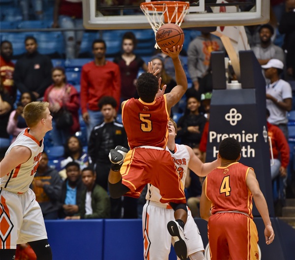 Desperate to catch up, NCH's Lorenzo Sparks launched, and made, long-range threes in the third quarter.