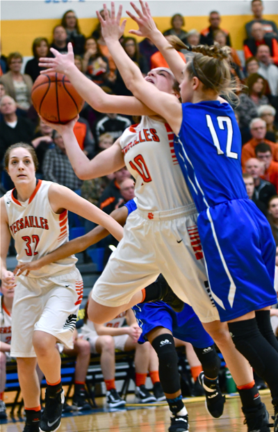 Cami makes her move towards the baskets.