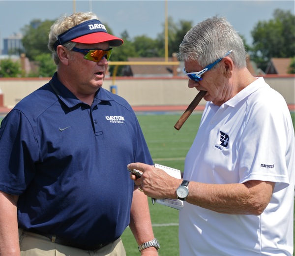 Chamberlin chews the fat over football - while Hal McCoy chews on a Monte Cristo during media day.