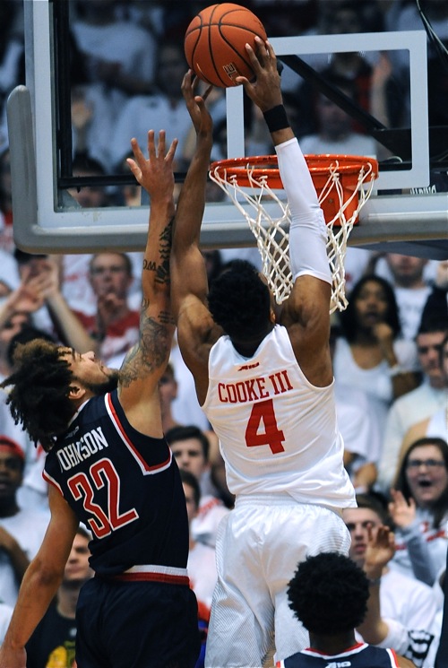 Charles Cooke played above the rim to score over Richmond's Julius Johnson.