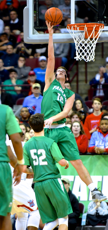 Fairland's Collin Van Horn scores at the rim for the Dragon in the third quarter.