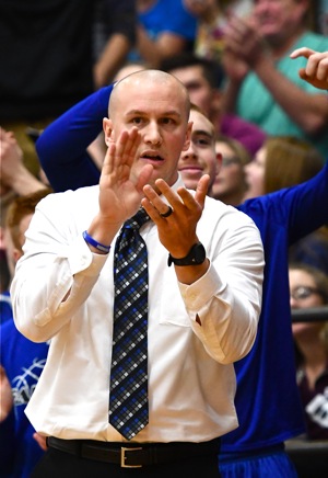 Fairlawn coach Justin Tidwell applauds the effort of his team in the final moments of the game.