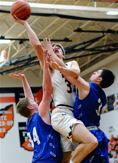 "Our coaches really gave us a good game plan," said Nathan Lessing (#3, above), contesting Jackson Centers Brady Wildermuth.