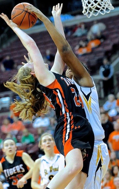 She scored 24 points, but Kamryn Troike also blocked shots...to big in the post for this attempt by Cassie Meyer.