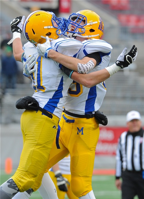 That winning feeling...teammates from Marion Local celebrated their ninth state title.