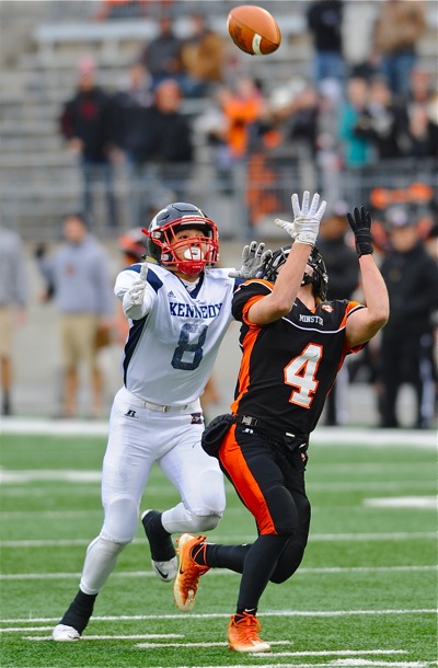 Degree of difficulty?  Minster's Isaac Schmiesing had to look directly back over his head to find the football...and he made this first quarter catch.