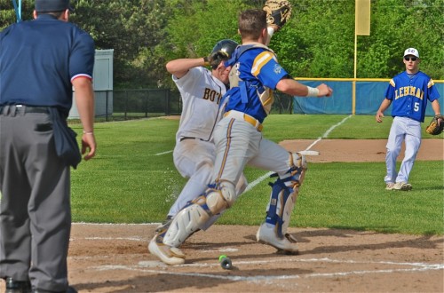 Lehman catcher Max Schutt records an out at the plate in the third on a would-be Botkins suicide squeeze.