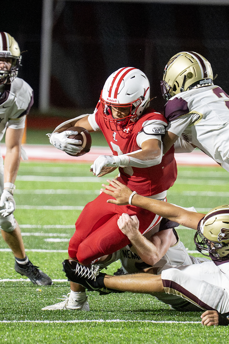 London's Isaiah Near was a triple-threat as a runner, receiver and defensive stalwart in the Red Raiders' narrow, season-opening loss. (PressPros Feature photos by Logan Howard).