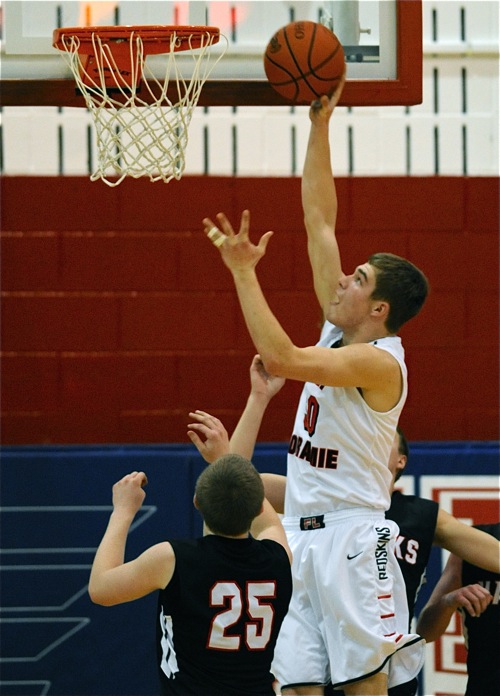 Tyler Siegel was unstoppable around the rim, finishing with 21 points for winning Loramie.
