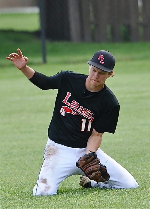 Carter Siegel made the catch...and then rose to throw out a Russia runner at the plate in the third inning.