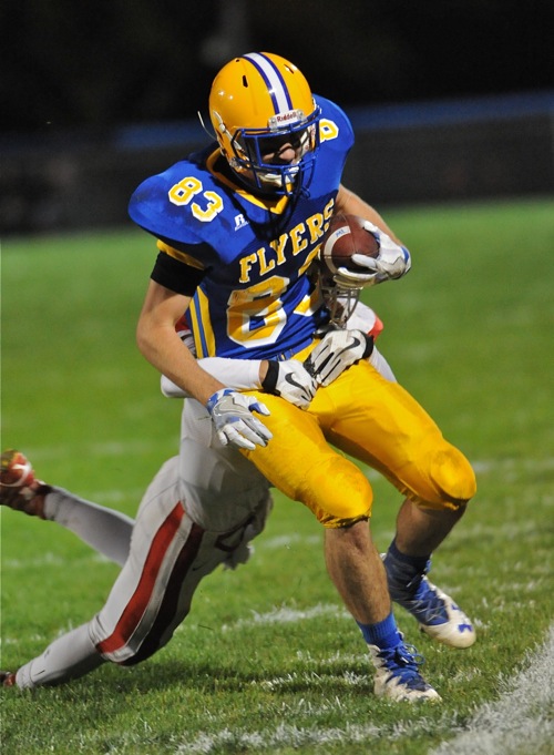 Matt Kahle tip-toes the sideline after making a catch for his first quarter touchdown.
