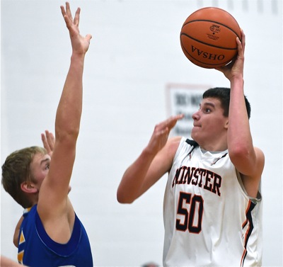 Minster's Jarod Schulze (#50) got the 'Cats off to a quick start, scoring the game's first six points.