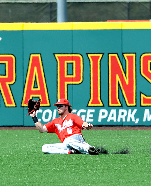 Center fielder Troy Montgomery makes a sliding catch of a line drive in Sunday's finale in Maryland.