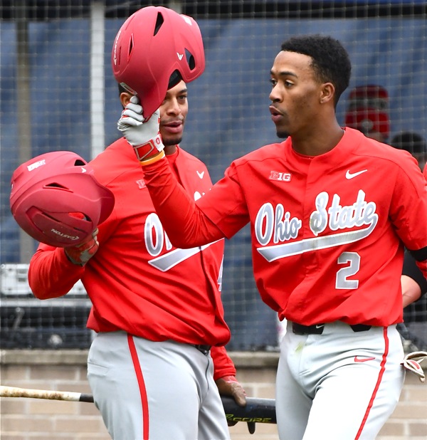 Captain Jalen Washington (#2) celebrates his second home run in the first game with Noah McGowan, who hit three in the second game.