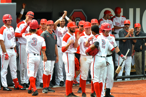 Celebration from the dugout for Senior Jalen Washington's final homerun at Bill Davis Stadium.
