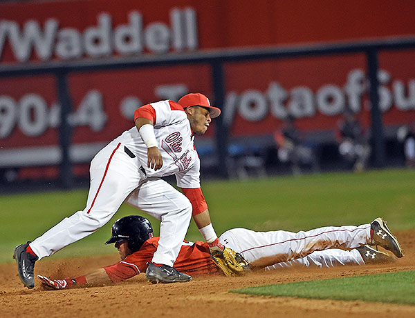 Second baseman Noah McGowan applies the tag on a steal attempt by Utah's Josh Rose.