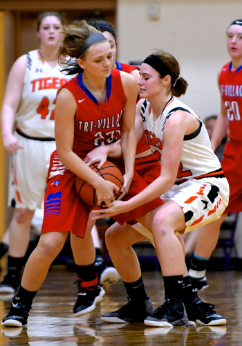 A jump ball is called after these two struggle to get the ball in their own possession.