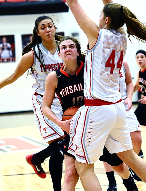 Tipp, the top defensive team in the GWOC North, put the squeeze on Versailles guard Kami McEldowney.