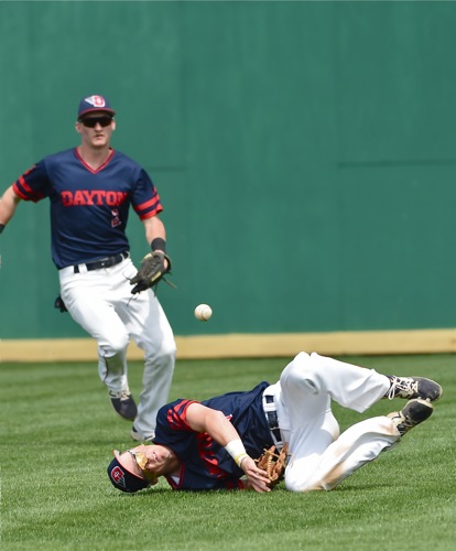 Right fielder Tate Hagen gets piled up attempting a diving catch in the sixth inning.