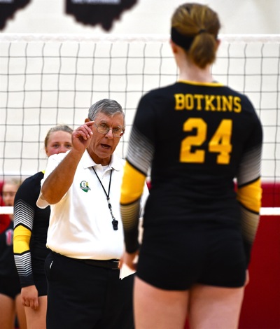Official Barry Wegman tries to sort things out during a stoppage of play for correcting lineups.