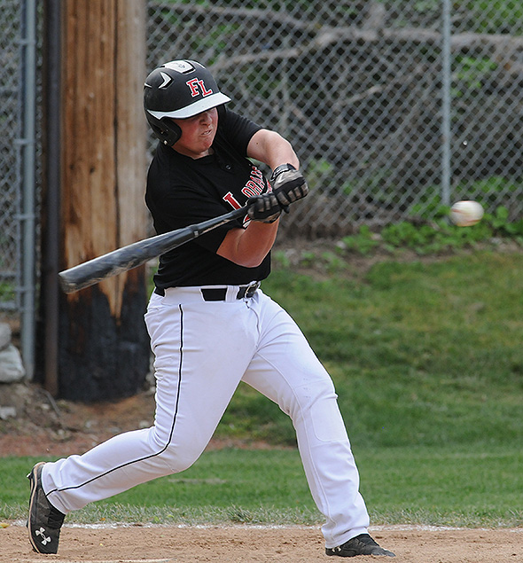 Shane Hilgefort connects on one of ten Loramie hits in the Sectional Final against Triad.