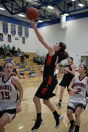 Kami McEldowney had 13 points to help lead Versailles to yet another sectional title.